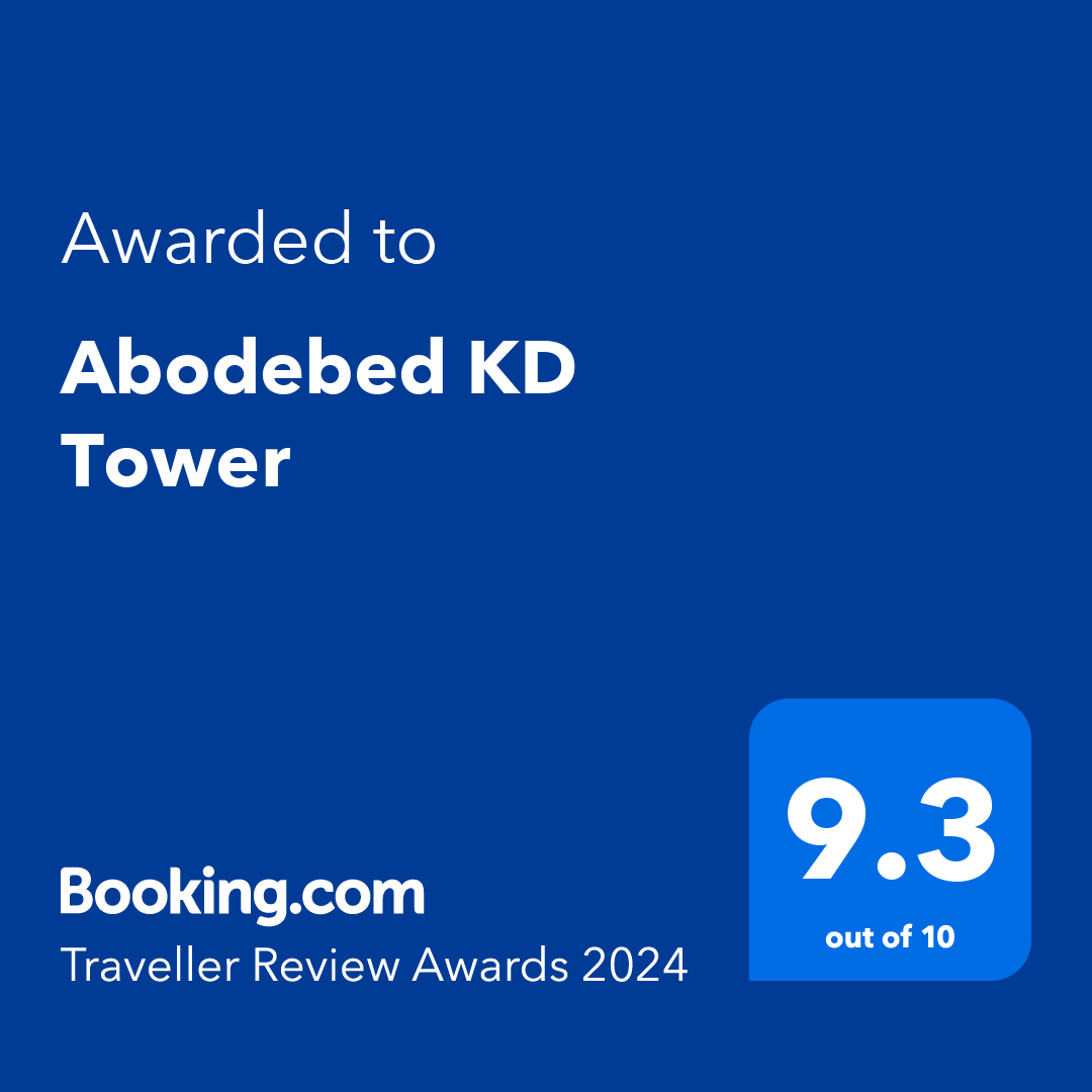 A blue banner shows that Abodebed KD Tower received a Traveller Review Award 2024 from Booking.com with a rating of 9.3 out of 10.